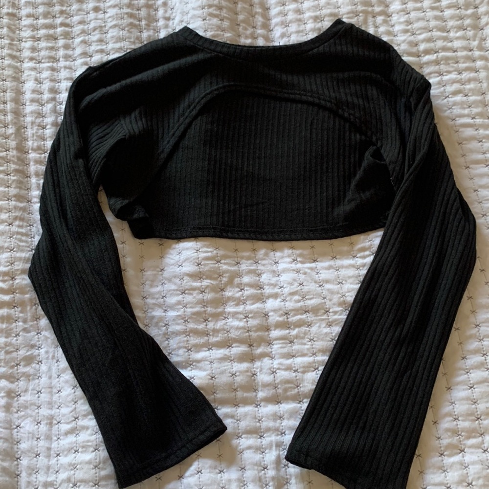 A pullover that covers arms and upper neck.